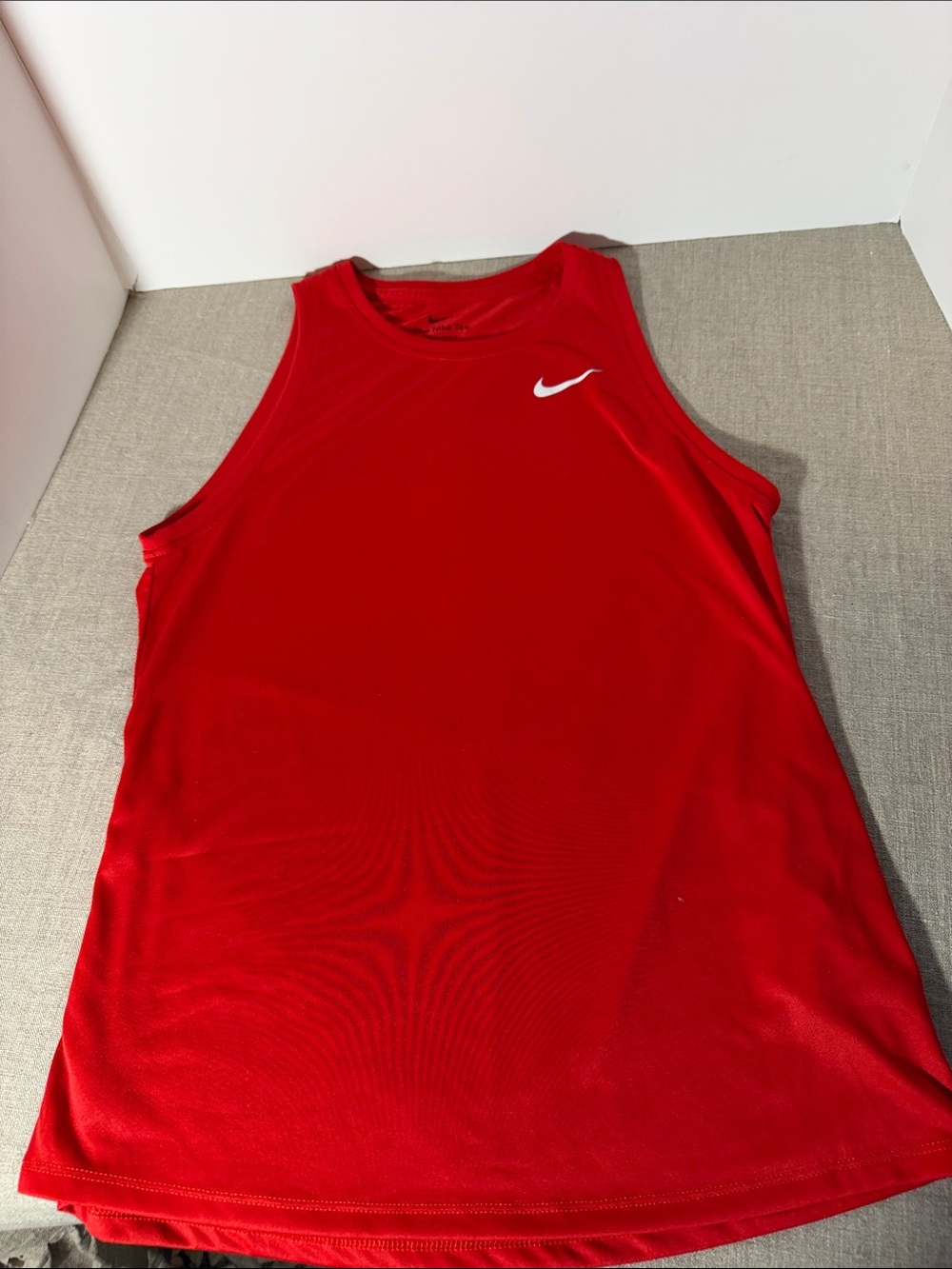 Nike Red Sleeveless Athletic Tank with White Swoosh. WT269